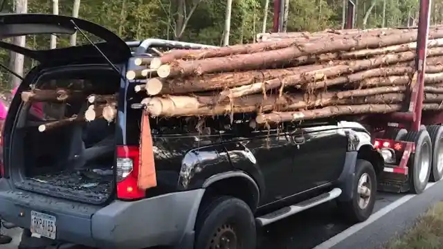 #20. Car Impaled By Logs